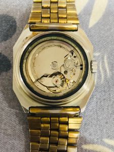 vintage seiko 5 and omex wtach