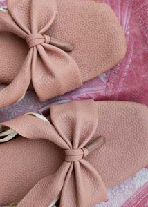Women's Peach Flats With Bow Detail