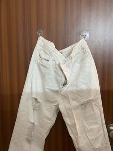 Cream Distressed Denim Jeans