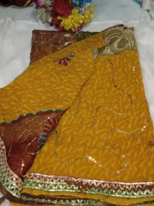 Embellished Brown Net Saree with blouse