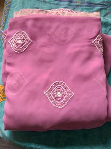 Georgette saree eith blouse..border and design...Pink in colour..