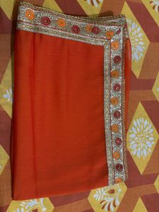 Vibrant Orange Saree with Golden Border