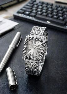 Silver Tone Watch with Intricate Design