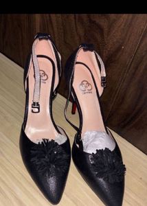 Stylish Black Heels with Pom-Pom Accent
