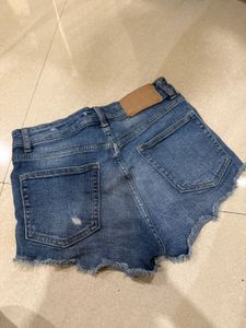 Distressed Denim Shorts