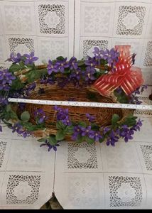8. Wicker Basket with Purple Flowers