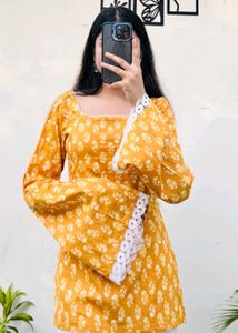 Pure cotton Yellow Printed Kurta with Lace Detail