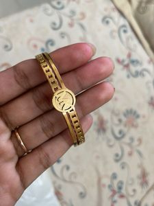 Elegant Gold Tone Bangle Bracelet