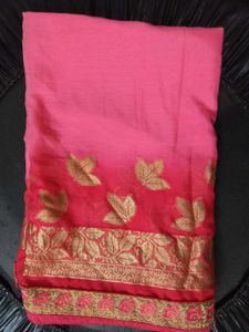 Elegant Pink Saree with Golden Leaf Motifs