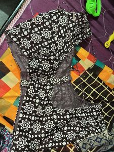 Vibrant Chequered Saree with Floral Motifs