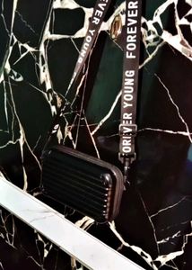 Black Clutch with "Forever Young" Strap