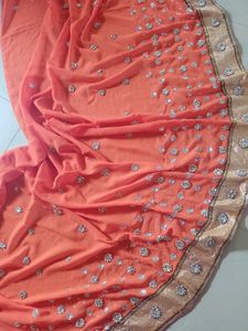Stunning Orange Embellished Saree