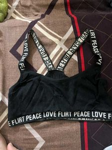 Trendy Black Ribbed Bra with Statement Straps