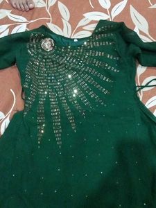 green colour long gown ....  mirror work