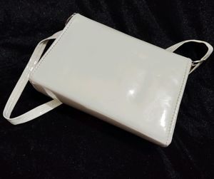 White Slingbag With Golden Chain And Superb Look