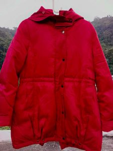 Vibrant Red Puffer Jacket with a Hoodie