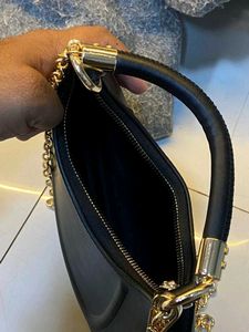 IMPORTED PREMIUM QUALITY MOONSHAPE SLING BAGCLASSY