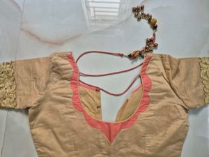 beige cotton blouse