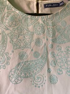 White Sleeveless Top with Paisley Print