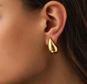 Elegant Pearl and Black Teardrop Earrings