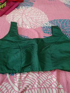 green sleevless blouse