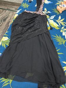 Elegant Black Saree with Floral Blouse