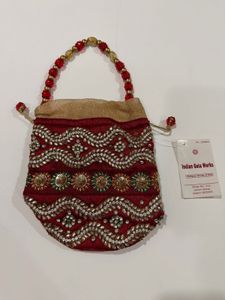 Brand new Maroon &amp; Embellished Potli Bag