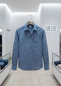 UNIQLO Men's Blue Printed Button-Up Shirt