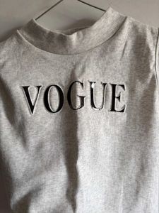 Vogue Sleeveless Mock Neck Crop Top