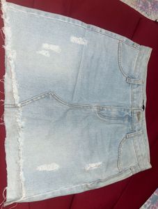 Light Wash Ripped Denim Skirt