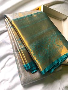 Exquisite Grey Silk Saree with Gold Border