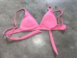 tri-bralette style bikini top and pink bot