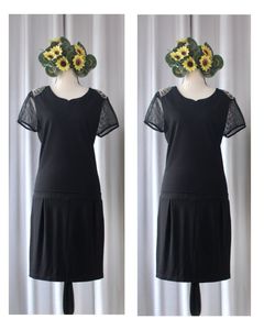 Chic Black Dress with Sheer Sleeves