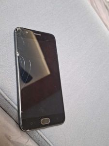 Oppo A57 Smartphone with Cracked Screen