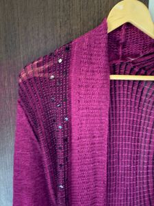Open-knit shrug with shimmer detailing