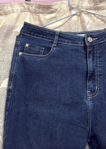 Flared Denim Jeans with Rhinestone Detail