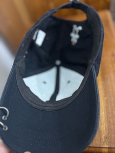 Stylish Navy Baseball Cap with Ring Detail