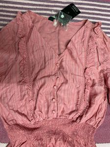 Pink Smocked Peplum Blouse