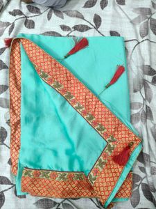 Elegant Turquoise Saree with Brocade Blouse