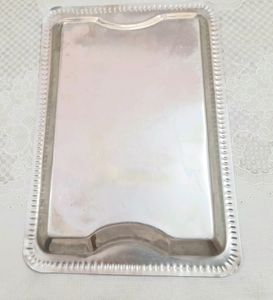 New  unused  stainless  steel  designer  tray