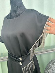 Elegant Black Dress with Fringe Detail