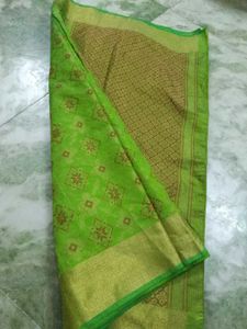 Vibrant Green Saree with Golden Border