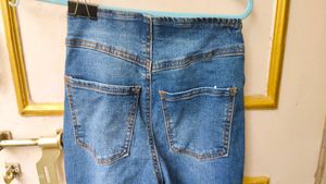 Trendy Flared Jeans with Ripped Knees