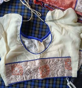 Orange Cream saree with blouse and peticoat