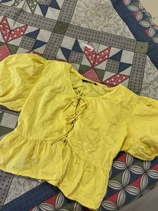yellow Tie-Up Peplum Top