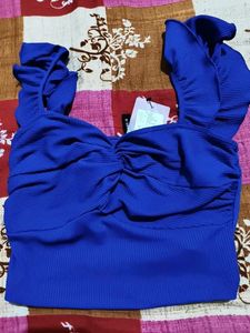 Blue Ruffle Sleeve Twist-Front Top