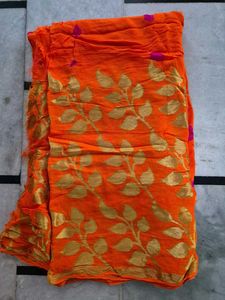 Vibrant Orange Saree with Gold &amp; Pink Accents