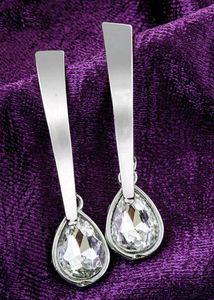 Trendy Silver Dangling Party Wear Earrings ....