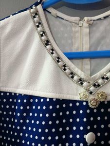Adorable Blue Polka Dot Dress with Embellishments