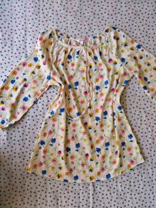 Floral top with Red Dhoti Pants